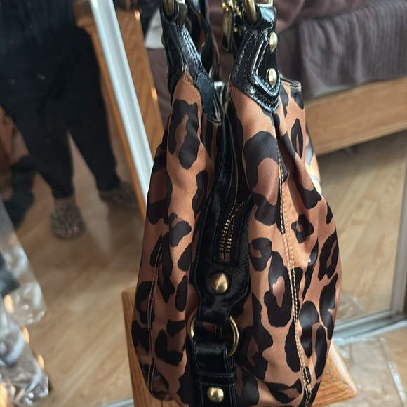 Coach Shoulder Bag. There are a few spots on the inside from make up. As is - Picture 3 of 5